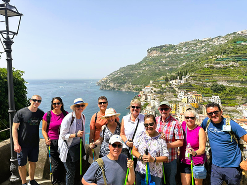 A group of travelers overlooking the Amalfi Coast.